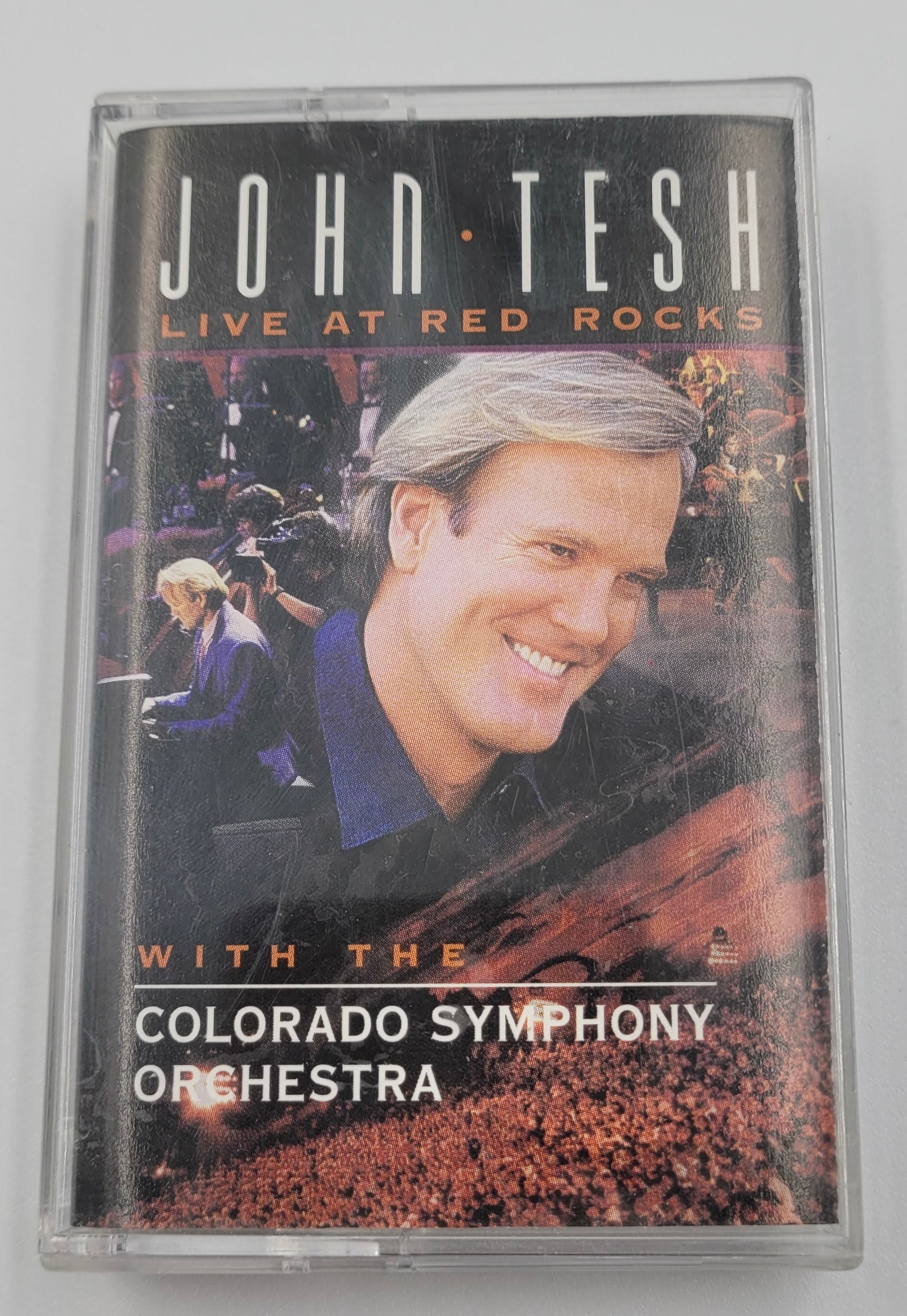 Front cover of John Tesh Live at Red Rocks cassette featuring Colorado Symphony Orchestra